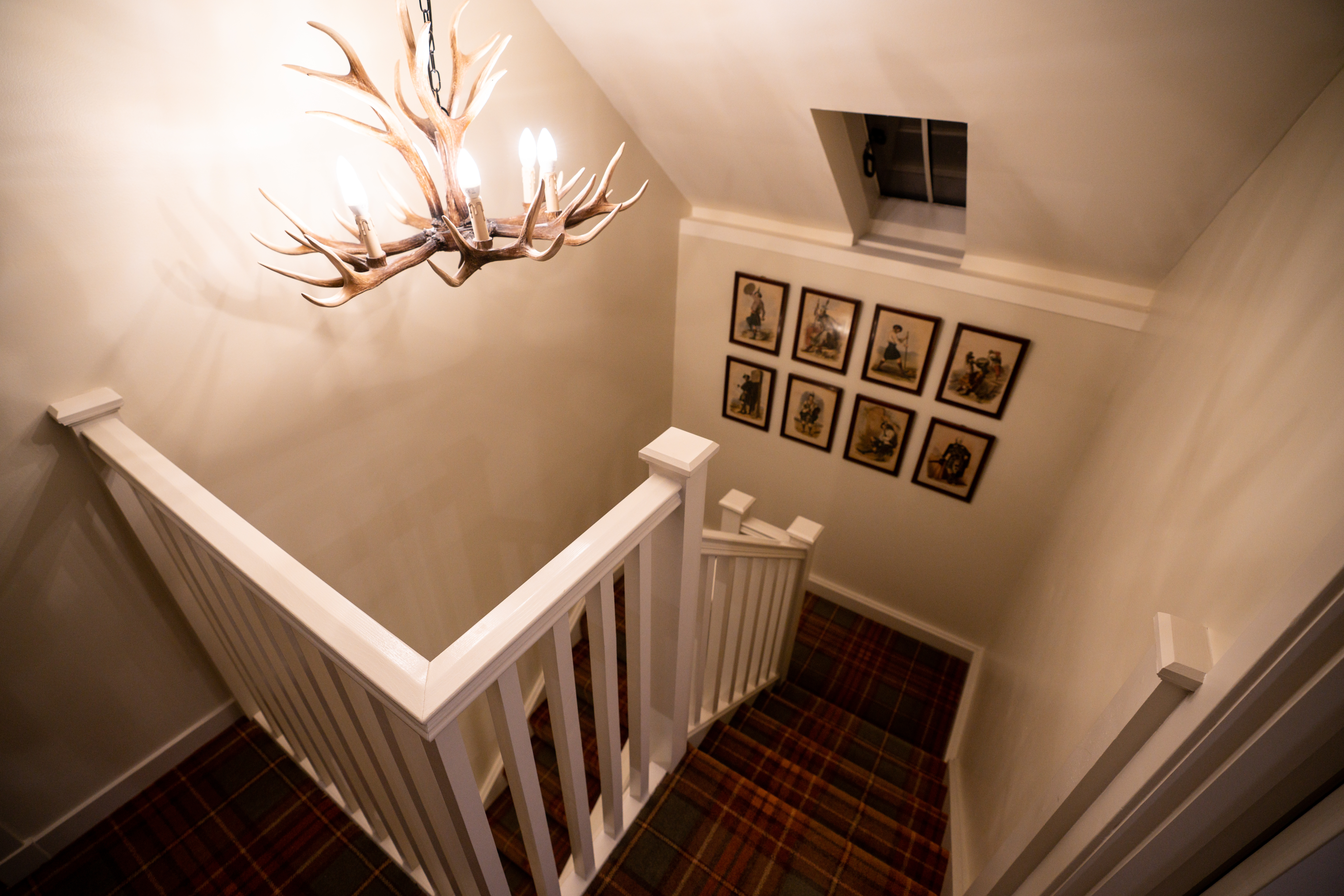 Showing a staircase that has been painted by Alan Cox Decorators
