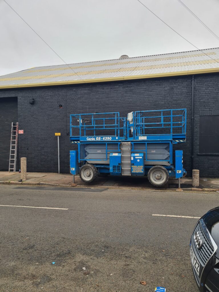 Industrial building exterior suitable for commercial painter and decorator Leicester services.