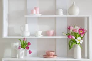 tulips in vase on white shelf - spring light decorating