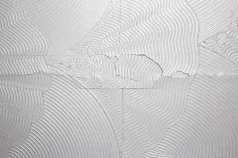 Artex ceiling cracking and breaking on the plaster board joins.